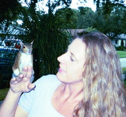 denise holds junior up for the camera